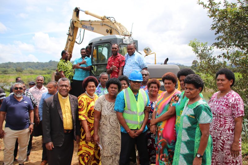 Minister-for-Waterways-and-Environment-Hon-Dr-Manhedra-Reddy-with-the-villagers.jpg