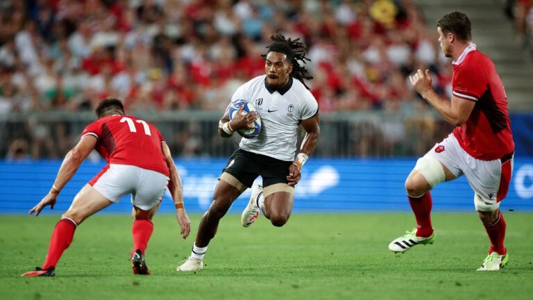 Selesitino-Ravutaumada-of-Fiji-breaks-forward-on-the-ball-ahead-of-Josh-Adams-of-Wales-768x432-1.jpg