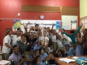 Group-Photo-with-Children-in-Yat-Sen-Primary-School-in-Fiji-after-Legislate-Peace-Campaign-1.jpg