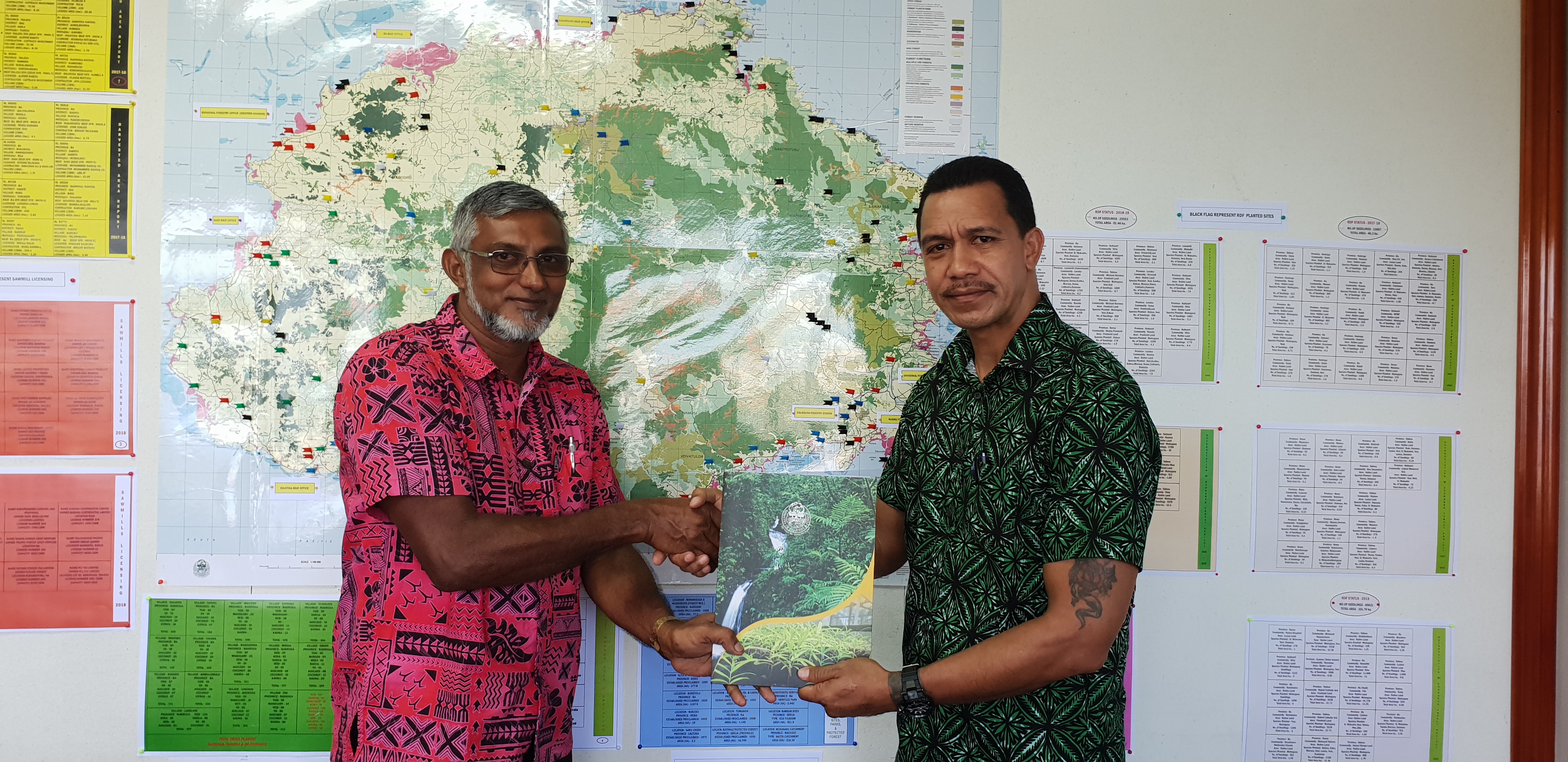 Ministry-of-Forestry-Permanent-Secretary-Mr-Pene-Baleinabuli-hands-over-a-logging-license-to-Mr-Ashraf-Khan-on-Friday..jpg